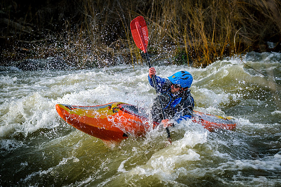 Kayaker, Kyle Keegan, on the Lower Malad River, near Hagerman, Idaho